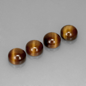 Натуральный коричневый tiger's eye  карата огранка круг, непрозрачный