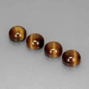 Натуральный коричневый tiger's eye  карата огранка круг, непрозрачный