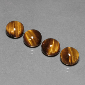 Натуральный коричневый tiger's eye  карата огранка круг, непрозрачный