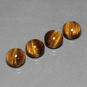 Натуральный коричневый tiger's eye  карата огранка круг, непрозрачный