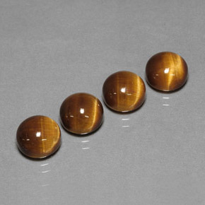 Натуральный коричневый tiger's eye  карата огранка круг, непрозрачный