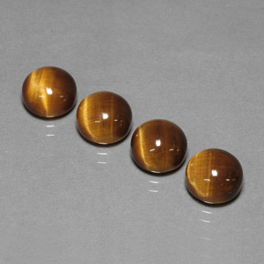 Натуральный коричневый tiger's eye  карата огранка круг, непрозрачный