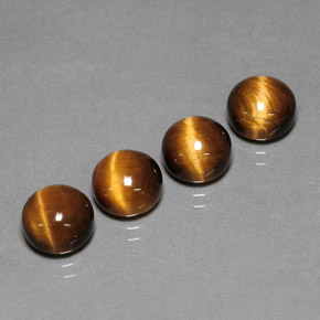 Натуральный коричневый tiger's eye  карата огранка круг, непрозрачный