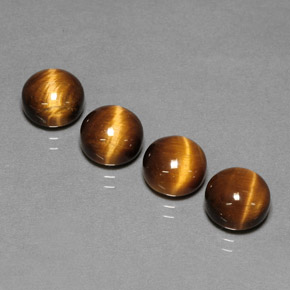 Натуральный коричневый tiger's eye  карата огранка круг, непрозрачный