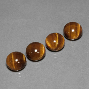Натуральный коричневый tiger's eye  карата огранка круг, непрозрачный