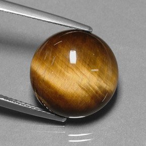 Натуральный коричневый tiger's eye 11,12 карата огранка круг, непрозрачный
