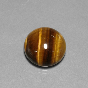 Натуральный коричневый tiger's eye 11,77 карата огранка круг, непрозрачный
