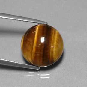 Натуральный коричневый tiger's eye 11,77 карата огранка круг, непрозрачный