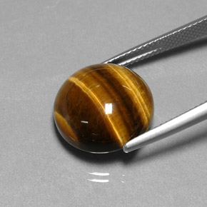 Натуральный коричневый tiger's eye 11,77 карата огранка круг, непрозрачный