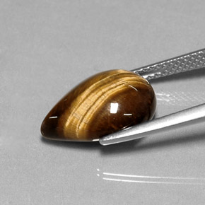 Натуральный коричневый tiger's eye 5,17 карата форма груши, непрозрачный