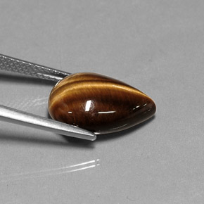 Натуральный коричневый tiger's eye 5,27 карата форма груши, непрозрачный
