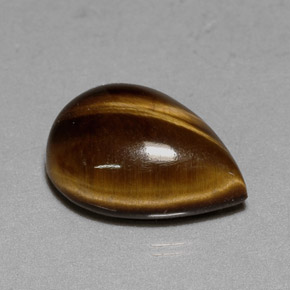 Натуральный коричневый tiger's eye 5,23 карата форма груши, непрозрачный