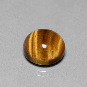 Натуральный коричневый tiger's eye 6,69 карата огранка круг, непрозрачный