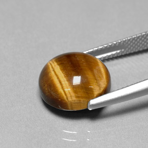 Натуральный коричневый tiger's eye 6,69 карата огранка круг, непрозрачный