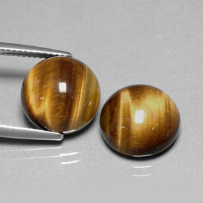 Натуральный коричневый tiger's eye  карата огранка круг, непрозрачный