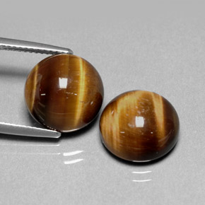 Натуральный коричневый tiger's eye  карата огранка круг, непрозрачный