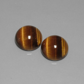 Натуральный коричневый tiger's eye  карата огранка круг, непрозрачный