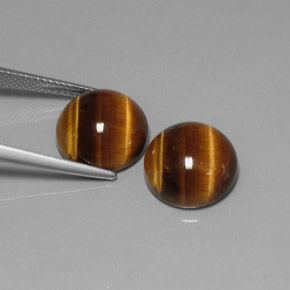 Натуральный коричневый tiger's eye  карата огранка круг, непрозрачный