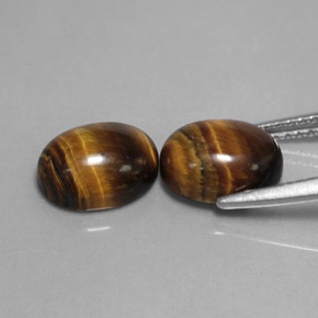  карата, натуральный Золотисто-коричневый Тигровый глаз, Огранка Овал, Непрозрачный