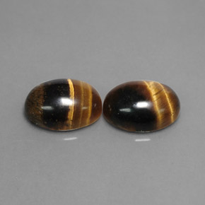 Натуральный коричневый tiger's eye  карата огранка овал, непрозрачный