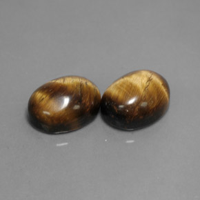  карата, натуральный Золотисто-коричневый Тигровый глаз, Огранка Овал, Непрозрачный