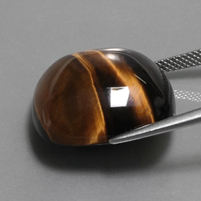 Натуральный коричневый tiger's eye 28,03 карата подушка крой, непрозрачный