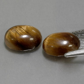Натуральный коричневый tiger's eye  карата огранка овал, непрозрачный