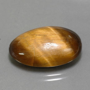 Натуральный коричневый tiger's eye 13,32 карата огранка овал, непрозрачный
