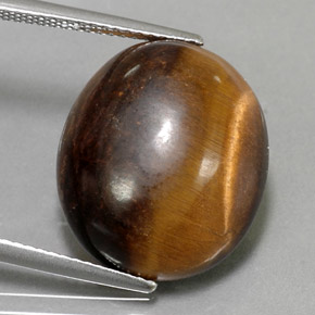 Натуральный коричневый tiger's eye 14,18 карата огранка овал, непрозрачный