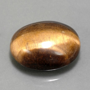 Натуральный коричневый tiger's eye 14,18 карата огранка овал, непрозрачный
