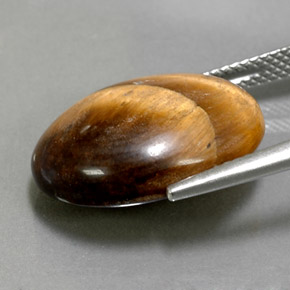 12.39 карата, натуральный Золотисто-коричневый Тигровый глаз, Огранка Овал, Непрозрачный