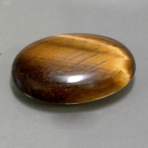 Натуральный коричневый tiger's eye 10,40 карата огранка овал, непрозрачный