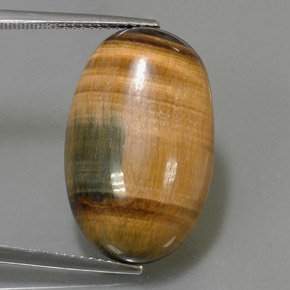 Натуральный коричневый tiger's eye 19,16 карата огранка овал, непрозрачный