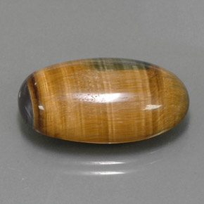 Натуральный коричневый tiger's eye 19,16 карата огранка овал, непрозрачный