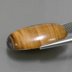 Натуральный коричневый tiger's eye 19,16 карата огранка овал, непрозрачный