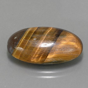 Натуральный коричневый tiger's eye 13,07 карата огранка овал, непрозрачный