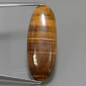 Натуральный коричневый tiger's eye 18,16 карата огранка овал, непрозрачный