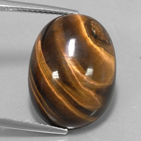 Натуральный коричневый tiger's eye 15,36 карата огранка овал, непрозрачный