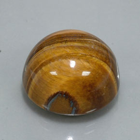 Натуральный коричневый tiger's eye 36,26 карата огранка круг, непрозрачный