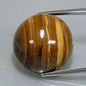 Натуральный коричневый tiger's eye 38,37 карата огранка круг, непрозрачный
