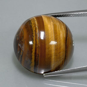 Натуральный коричневый tiger's eye 37,12 карата огранка круг, непрозрачный