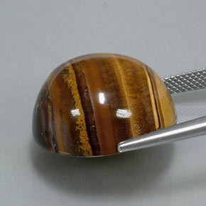 Натуральный коричневый tiger's eye 37,12 карата огранка круг, непрозрачный