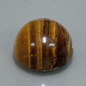 Натуральный коричневый tiger's eye 36,50 карата огранка круг, непрозрачный