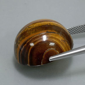 Натуральный коричневый tiger's eye 37,72 карата огранка круг, непрозрачный