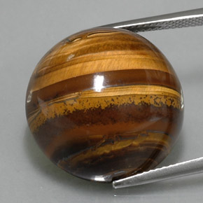 Натуральный коричневый tiger's eye 36,33 карата огранка круг, непрозрачный