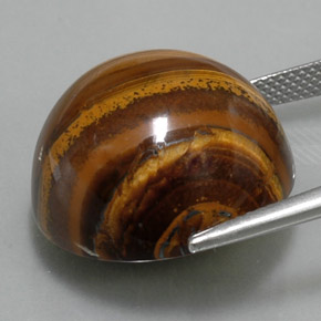 Натуральный коричневый tiger's eye 36,33 карата огранка круг, непрозрачный