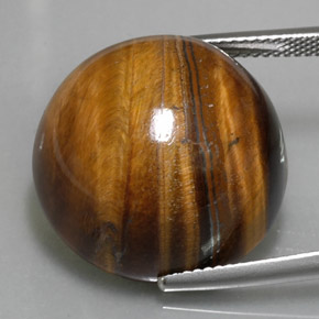 Натуральный коричневый tiger's eye 36,96 карата огранка круг, непрозрачный