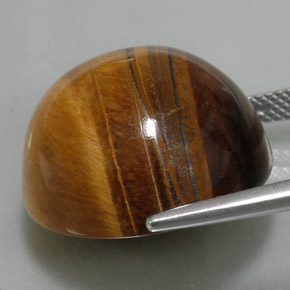 Натуральный коричневый tiger's eye 36,05 карата огранка круг, непрозрачный