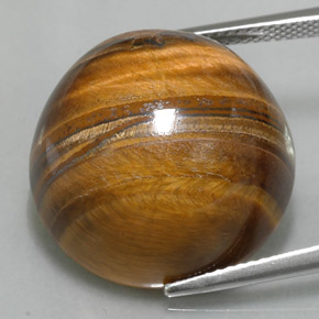 Натуральный коричневый tiger's eye 37,11 карата огранка круг, непрозрачный