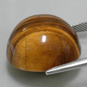 Натуральный коричневый tiger's eye 37,40 карата огранка круг, непрозрачный